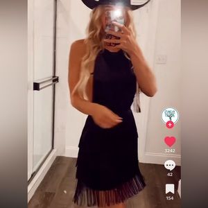 Punchy blondes black, backless fringe dress